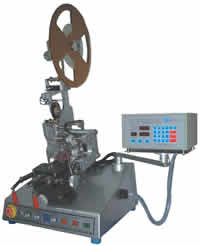 Small ID taping head toroid winder